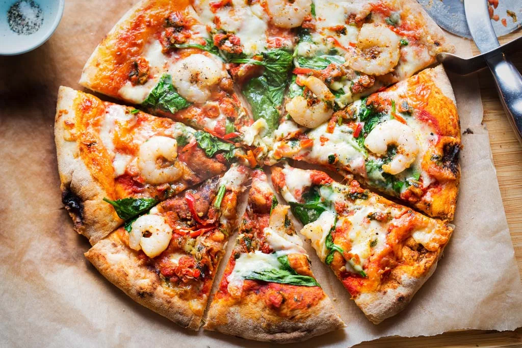 Cum să gătești pizza cu fructe de mare?